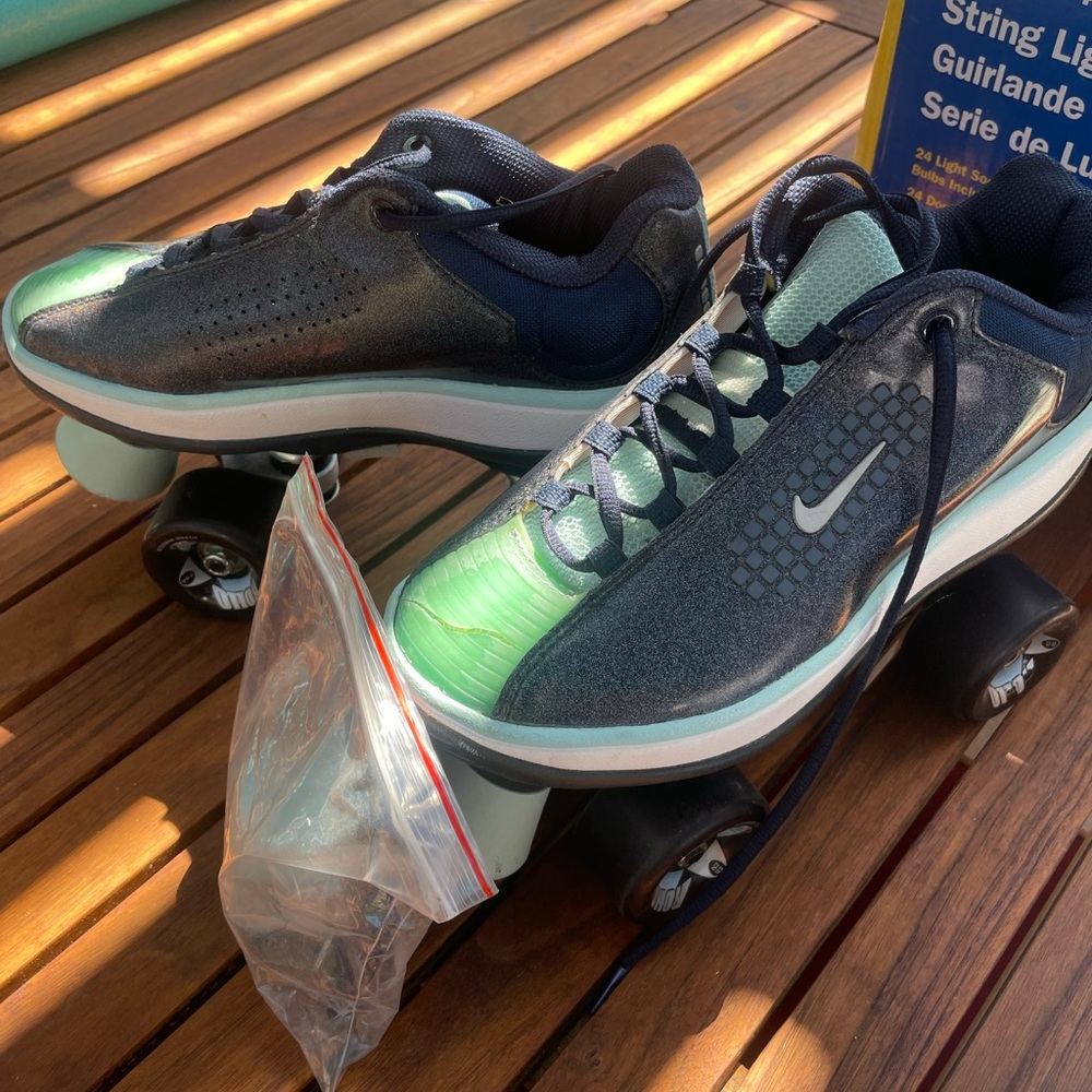 Nike roller skates. Shiny, Like new, worn once or twice, then stored for years.